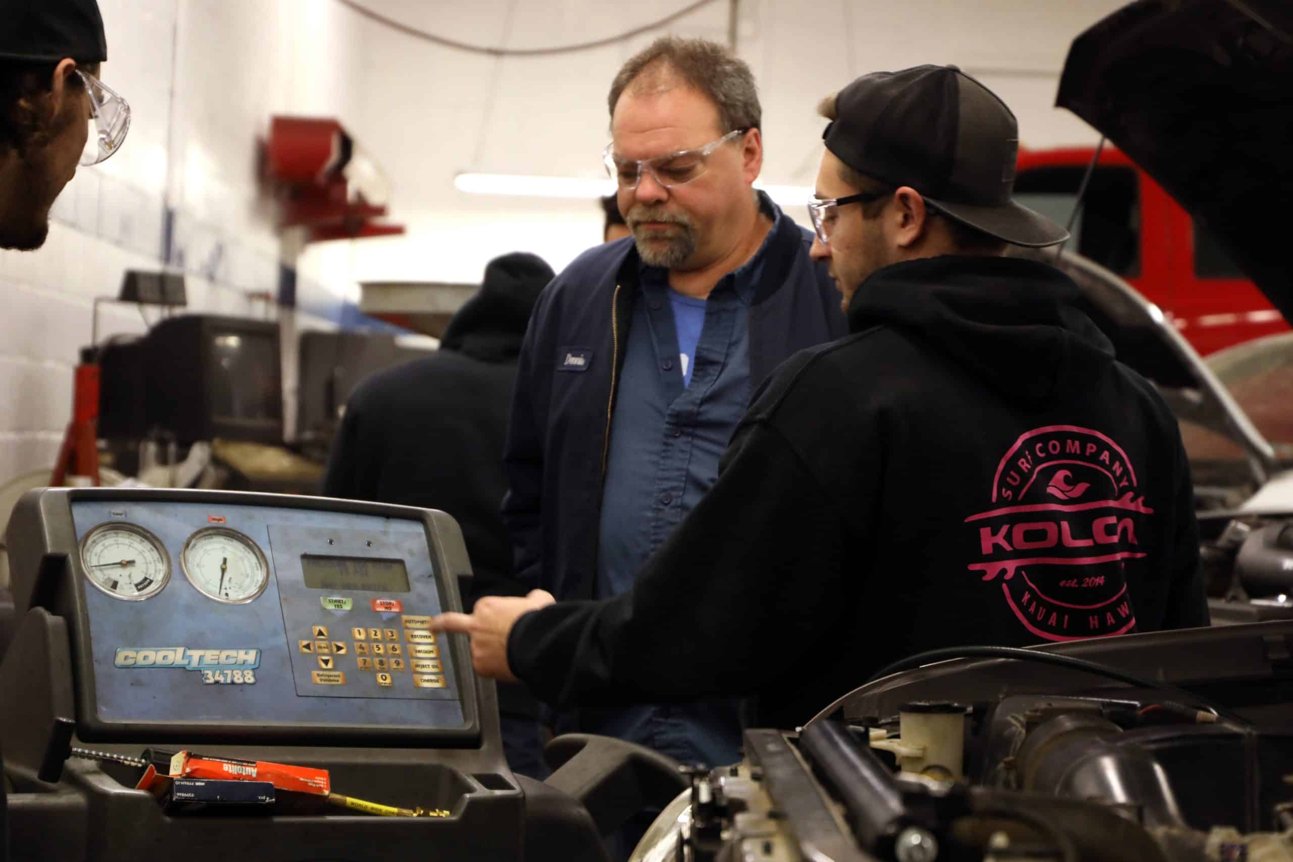 Diesel Technology Program Student Examining Reading on Equipment