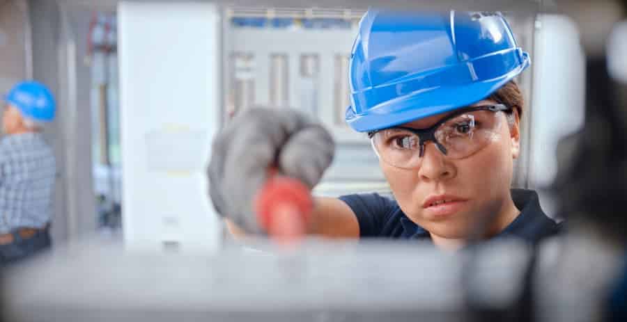 Electrician performing repairs at construction site