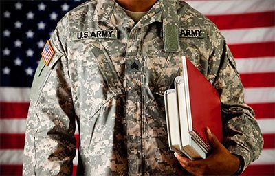 US Army Veteran Carrying Textbooks Under Arm