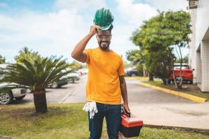 Joyful trade school graduate heading to work 